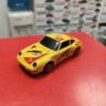 Porsche 911 Carrera желтый 1:43 Burago