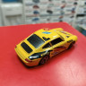 Porsche 911 Carrera желтый 1:43 Burago